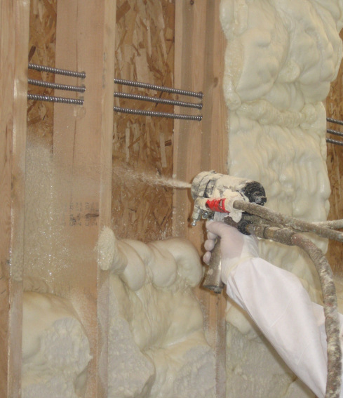 spray foam insulation being installed in new home construction