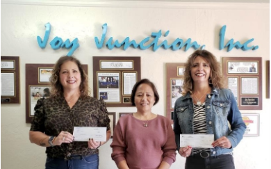 presentation of donation from Millers to Joy Junction Inc