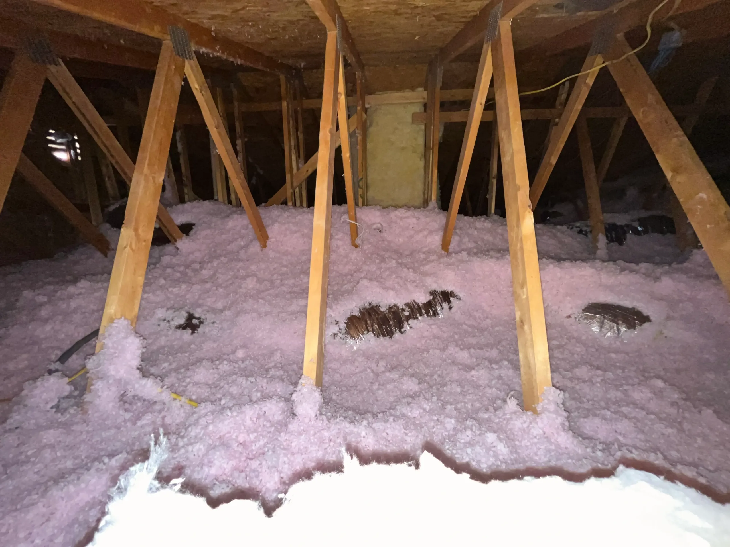 blown-in insulation in residential attic