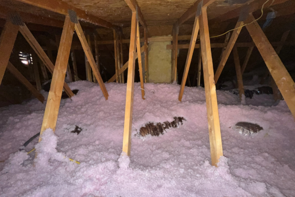 blown-in insulation in residential attic